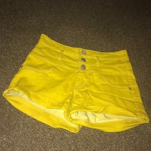 Yellow mid rise shorts